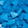 Blue Punishers MDMA Ecstasy Pills AAA+ (300mg). Round tablet commonly referred to as Punisher MDMA pill with skull logo imprint