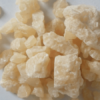 MDMA crystal close-up showing crystalline texture